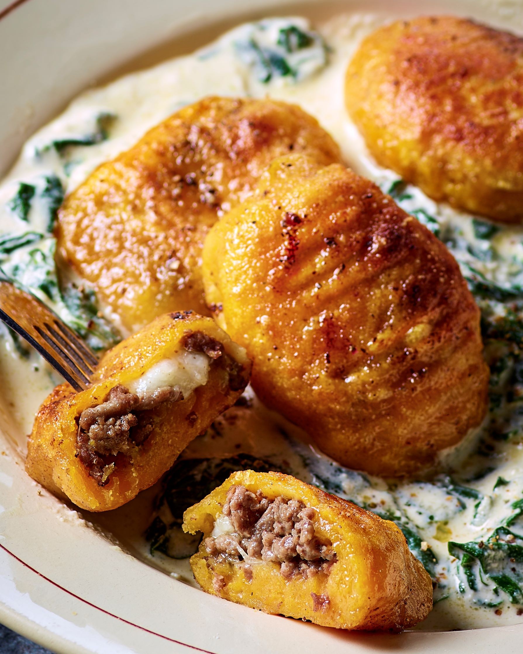 Gnocchis de butternut farcis bœuf mozzarella, sauce épinard ricotta