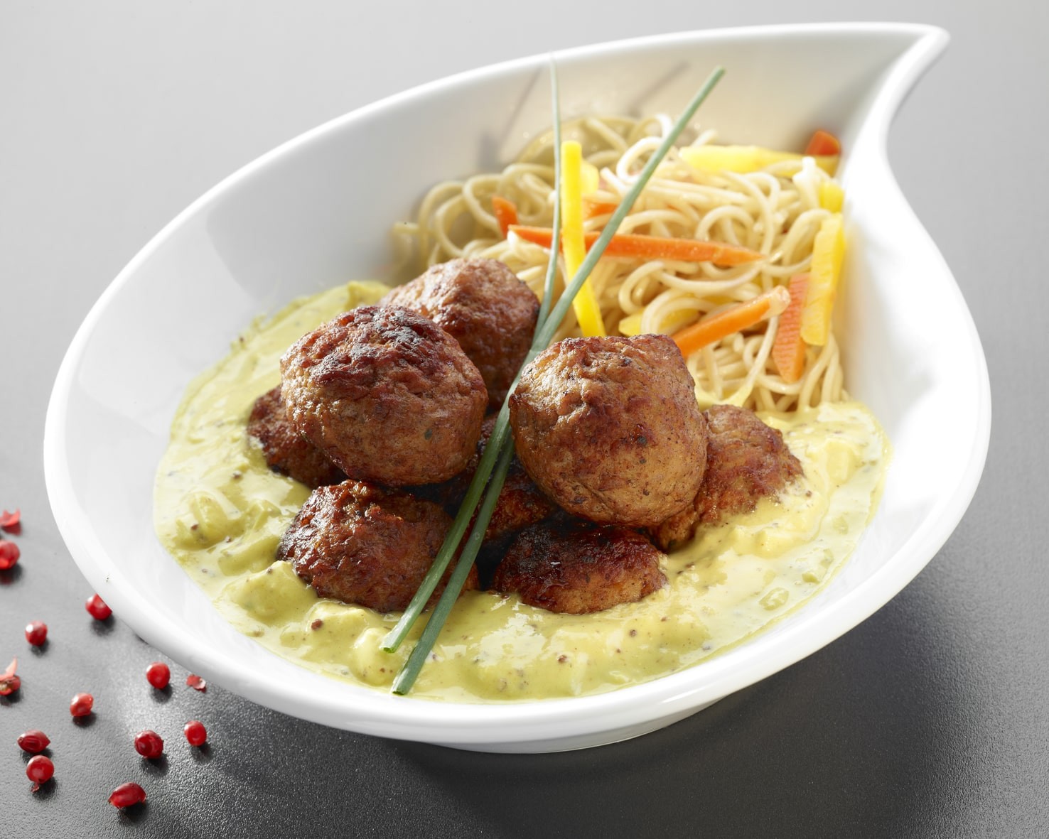 Boulettes gourmandes, sauce aux oignons moutarde et curry