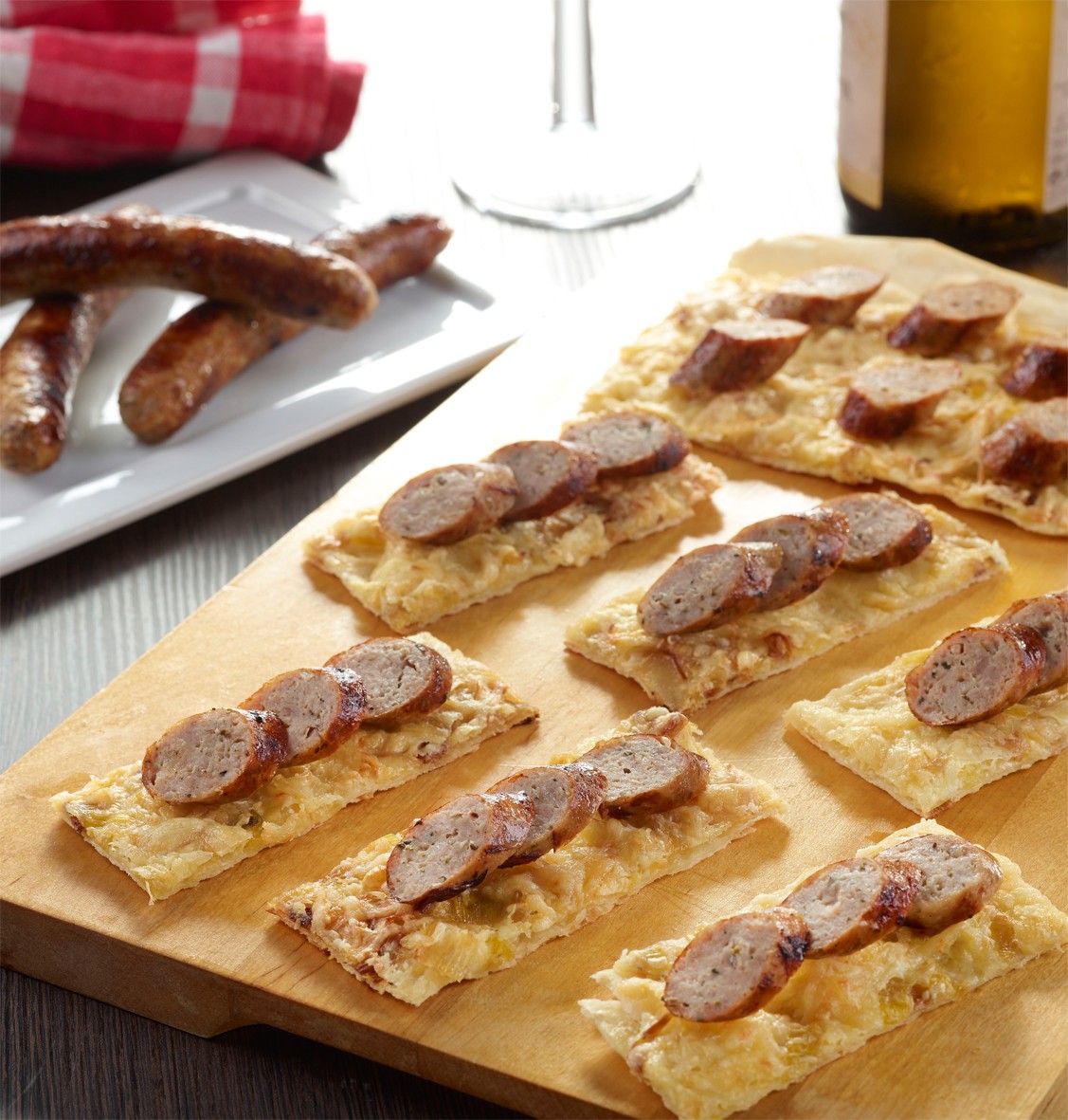 Flammekueche aux chipolatas, oignons et poireaux Bigard