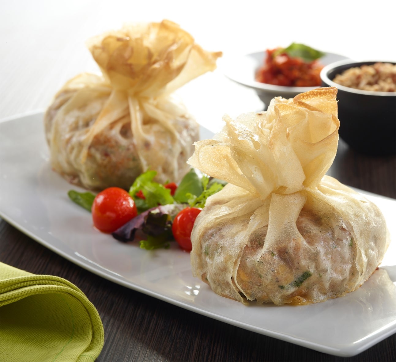 Aumônières à la farce aux légumes & tomate confite 